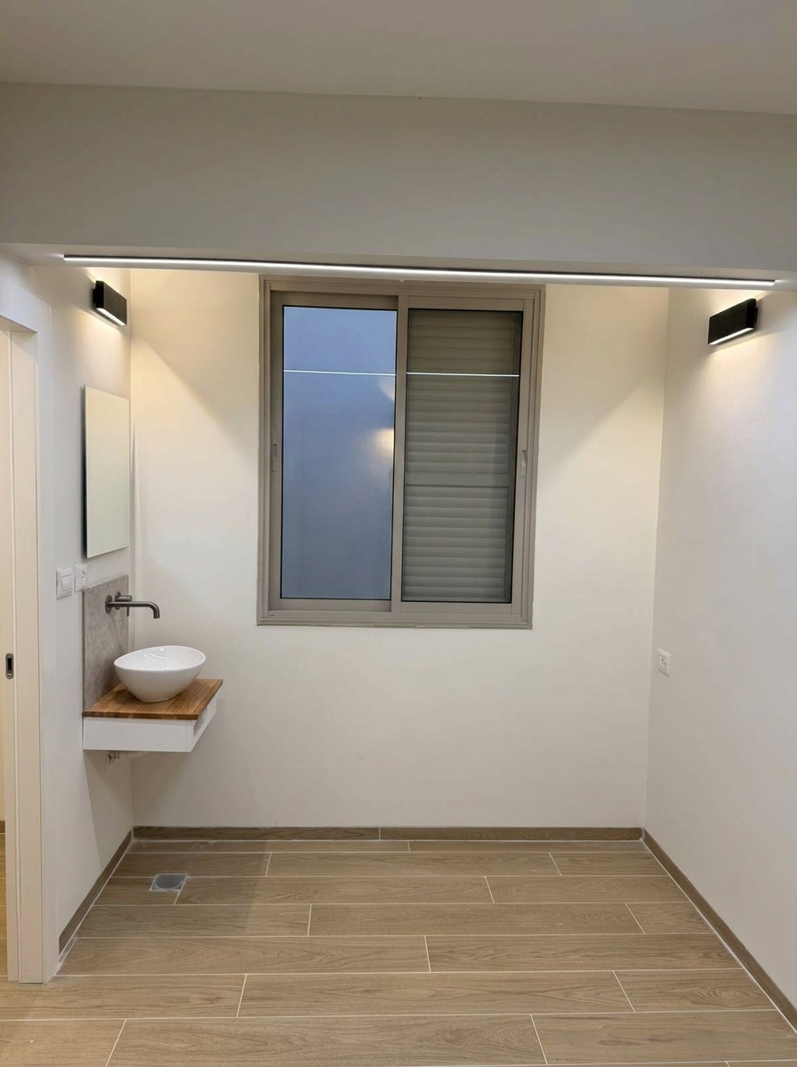 כניסה עם כיור צף ותאורה דקורטיבית